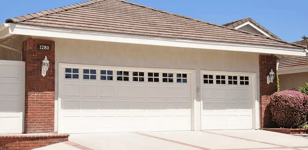 Residential garage door repair service for a double garage door in Anaheim, CA
