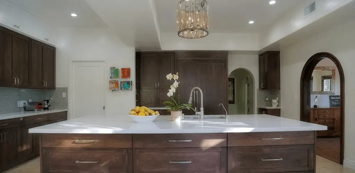 Cabinet refacing project with updated kitchen cabinets and island in Anaheim, CA